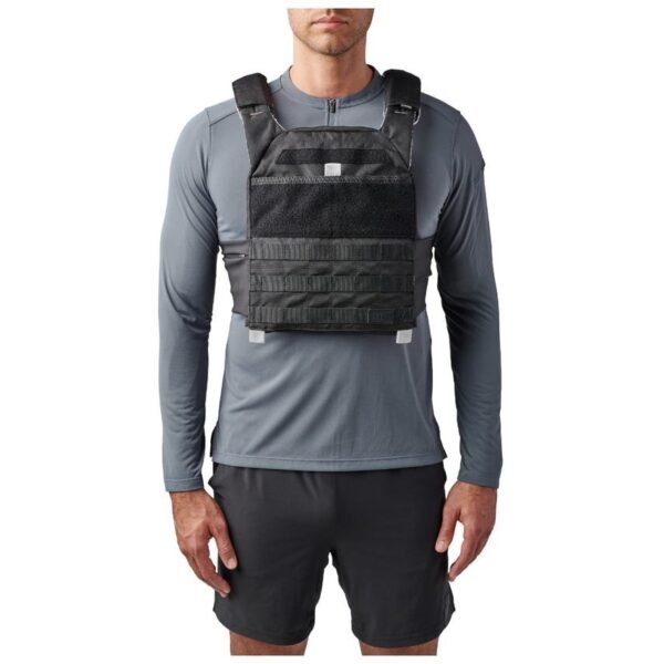 5.11 Tactical TacTec Trainer Weight Vest - Black Unleash your inner savage with the TacTec® Trainer Weight Vest, designed specifically for intense training sessions. Crafted from tough 600D polyester, this vest is built to withstand even the most demanding workouts. It features adjustable yoke shoulder straps with breathable mesh padding, ensuring comfort and ventilation while you push your limits. The breathable mesh body pads help keep you cool, while the adjustable stretch cummerbund ensures a secure and stable fit. The vest includes convenient pockets for storing accessories, and its front admin pocket, along with loop laser-cut and web MOLLE platforms, provide additional customization options for carrying pouches. Internal retention straps keep the weight plates securely in place during use. The TacTec® Trainer Weight Vest is also compatible with the 5.11® PC Convertible Hydration Carrier for added convenience during longer training sessions